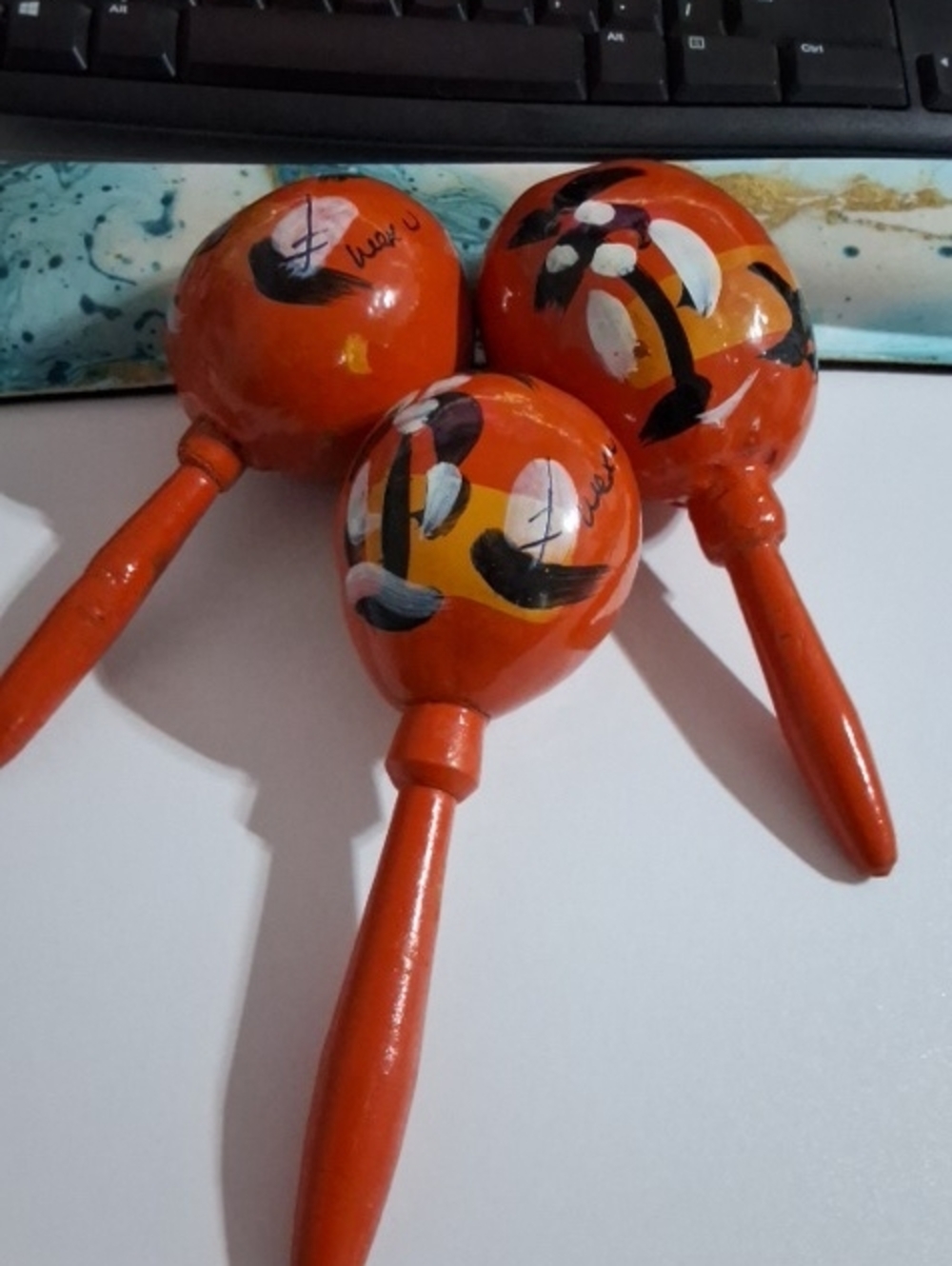 Bright Orange Hand-Painted Wooden Maracas – Set of 3
